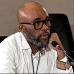 Cat Matlala in prison attire at Ad Hoc Committee hearing